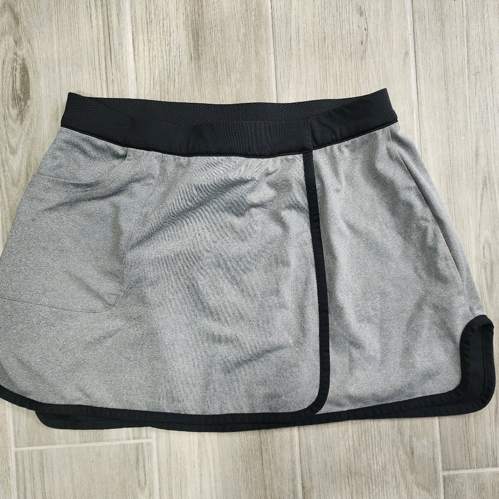 Tail reversible skirt with pockets
